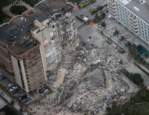 Aún no se sabe por qué colapsó el inmueble, dijo el alcalde Charles Burkett. ''Es como si hubiese explotado una bomba, pero estamos muy seguros de que una bomba no explotó, así que es otra cosa''. AFP / J. Raedle