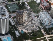 Un total de 53 personas fueron localizadas tras el derrumbe parcial del edificio en Surfside, al norte de  Miami Beach. AFP / J. Raedle