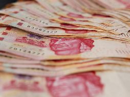 Este jueves, la moneda mexicana terminó en 19.86 unidades por dólar; su cierre más fuerte desde el 10 de junio. EL INFORMADOR / ARCHIVO