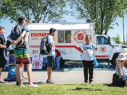 Ante las altas temperaturas, las autoridades han desplegado equipos de emergencia. AP/J. McIntosh
