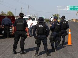 El grupo criminal huyó tras varios minutos de enfrentamiento sin que hubiera detenidos. AFP/ARCHIVO
