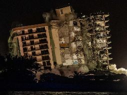 CONTINÚAN. Equipos de rescatistas continuarán con la búsqueda de cuerpos, luego que se demoliera el resto de la estructura del edificio. AFP