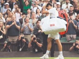 ¿DESPEDIDA?. El suizo, ocho veces campeón en Wimbledon, aún no piensa en el retiro, pero quizá no vuelga a jugar en la Catedral. AFP/ G.KIRK