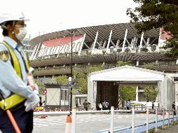 DESIERTO. Escenarios como el Estadio Nacional de Tokio lucirán con las tribunas vacías; el nuevo estado de emergencia en la capital estará vigente hasta el 22 de agosto. AP • S. Kita