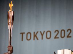 El relevo de la antorcha olímpica quedó relegado a pequeñas ceremonias de encendido de la llama sin espectadores, después de que se prohibiera el acto en las calles de varios departamentos y en Tokio. AFP / F. Fong