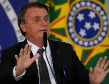 Bolsonaro, de 66 años, se viene quejando públicamente de un hipo persistente desde la semana pasada, después de someterse a una cirugía de implante dental. AP / ARCHIVO