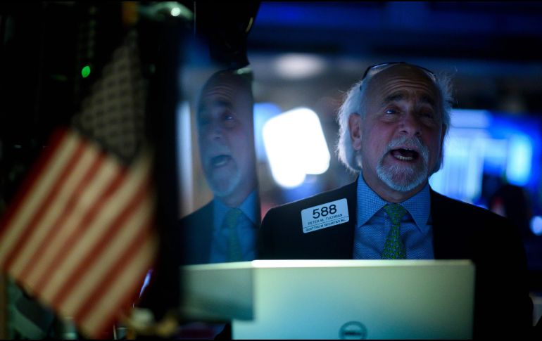 El Dow Jones subió un 0.15%, S&P 500 perdía un 0.33% y Nasdaq se dejó 0.70 por ciento. AFP/ARCHIVO