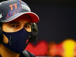 El piloto mexicano aún no tiene la certeza de si seguirá representando al equipo austriaco más allá de lo que marca su contrato. ARCHIVO