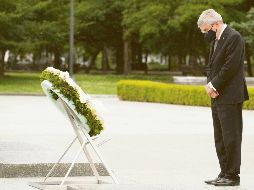 El líder del olimpismo hizo guardia de honor en Hiroshima. Ahí hubo protestas. AFP/E. Hoshiko