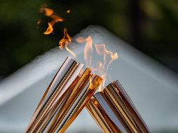 ''Los Juegos de la reconstrucción''. Se especula que la persona escogida para encender el pebetero olímpico sea un superviviente o alguno de los desplazados por el tsunami o la crisis nuclear de Fukushima. AFP / ARCHIVO