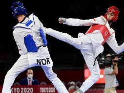 El medallista mexicano Óscar Salazar no entrena a México, sino a la selección nacional de Egipto, la cual este día subió al podio por cortesía de Hedaya Malak y Seif Eissa (D). AFP / J. Soriano