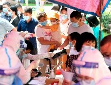 Los contagios fueron detectados en siete trabajadores migrantes en la ciudad, de los cuales cuatro no presentaban síntomas de la enfermedad. EFE / S.Zhou