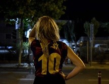 La noticia causó un bajón anímico en el aficionado culé. AFP/P. BARRENA