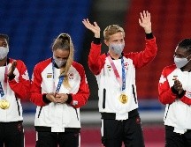 Quinn, futbolista de Canadá, se convirtió este viernes en el primer deportista abiertamente transgénero y no binario en ganar una medalla olímpica, en otro momento histórico que dejará Tokio 2020. AP / A. Penner