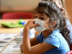 Los niños desarrollan por lo general un cuadro más leve de la enfermedad cuando se contagian. GETTY IMAGES /