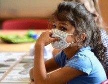 Los niños desarrollan por lo general un cuadro más leve de la enfermedad cuando se contagian. GETTY IMAGES /