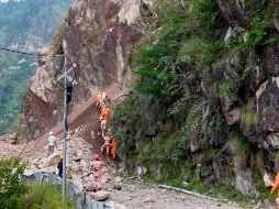 Los deslizamientos de tierra y las inundaciones son frecuentes en la India, sobre todo en la época estival. AP /