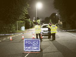 El hecho conmocionó al tranquilo pueblo de Plymouth; policías investigan las posibles causas del multiasesinato. AP/B. Birchall
