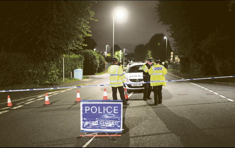 El hecho conmocionó al tranquilo pueblo de Plymouth; policías investigan las posibles causas del multiasesinato. AP/B. Birchall