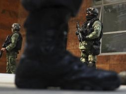 En el país hay más de 215 mil elementos de Sedena, Marina y Guardia Nacional desplegados para la protección de los ciudadanos. AP / ARCHIVO