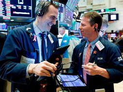 Todos los sectores terminaron hoy en verde, con las mayores ganancias para las empresas de tecnología, de servicios públicos y de comunicaciones. EFE/ARCHIVO