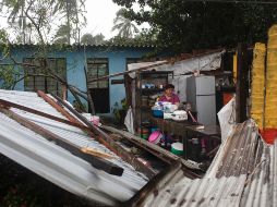 La Secretaría de Protección Civil Estatal reportó afectaciones en 22 municipios con inundaciones, caída de árboles, bardas, postes de energía eléctrica y espectaculares. AP / F. Márquez