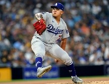 Julio Urías admitió un hit en cinco innings en blanco a su regreso de la lista de lesionados. AP / G. Bull