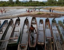 El viaje en piragua cuesta 40 dólares para que los lleve a la frontera de Costa Rica, pero llegar ahí significa atravesar una de las rutas más peligrosas del mundo, según la Unicef. AFP/R. Figueroa