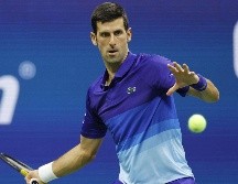 Djokovic, de 34 años, está en búsqueda de completar un Grand Slam en un año calendario y un récord de 21 títulos en estos torneos. AFP/S. STIER
