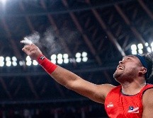El lanzador de bala malasio Muhammad Ziyad Zolkefli parecía haberse coronado campeón olímpico en la categoría F20, pero fue descalificado por haber llegado tarde a la competencia. AFP / P. Fong