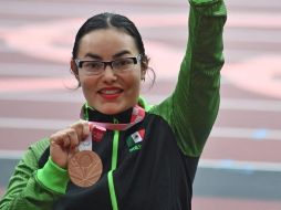 UNA MÁS. Para llegar a esta cantidad fue Rebeca Valenzuela quien subió al podio, ya que esta deportista oriunda de Sonora, logró la medalla de bronce dentro de la final de lanzamiento de bala categoría F12. TWITTER/@COPAME