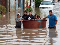 Aclaran que aún no se tiene un estimado de personas afectadas, lo que se determinará hasta que baje el nivel de agua. AFP/U. Ruiz