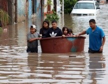 Aclaran que aún no se tiene un estimado de personas afectadas, lo que se determinará hasta que baje el nivel de agua. AFP/U. Ruiz