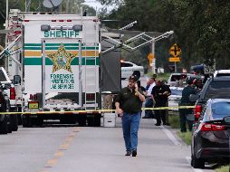 Oficiales del condado Polk trabajan en la escena del tiroteo en Lakeland, Florida. AP/Lakeland Ledger/M. Wilson
