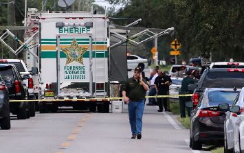 Oficiales del condado Polk trabajan en la escena del tiroteo en Lakeland, Florida. AP/Lakeland Ledger/M. Wilson