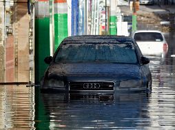 Los habitantes de Tula se encontraban reacios a desalojar sus viviendas debido a la rapiña en medio de las inundaciones. AFP / A. Estrella