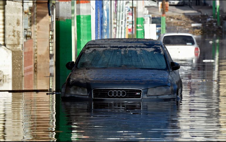 Los habitantes de Tula se encontraban reacios a desalojar sus viviendas debido a la rapiña en medio de las inundaciones. AFP / A. Estrella