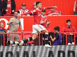 EUFORIA. Cristiano Ronaldo inicia con el pie derecho su nueva etapa con los ´Red Devils'. AFP/O. Scarff