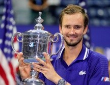 CAMPEÓN. El tenista de Moscú aprovechó su espectacular servicio y concentración para arruinar la gesta de Djokovic. AP/J. MINCHILLO