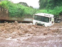 Las lluvias propiciaron el desbordamiento del arroyo de La Ordeña de Barajas, con afectaciones a 20 viviendas y la anegación de campos de cultivo. AFP/ARCHIVO