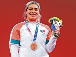 Aremi Fuentes levantó un total de 245 kg en los pasados Juegos Olímpicos de Tokio 2020, y además de obtener la medalla de bronce, se hizo en acreedora a un premio de 50 mil pesos por parte de las autoridades del país. XINHUA