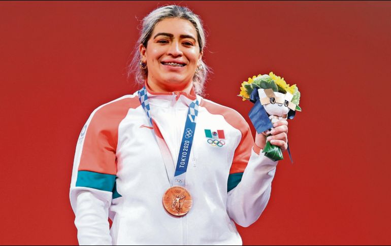 Aremi Fuentes levantó un total de 245 kg en los pasados Juegos Olímpicos de Tokio 2020, y además de obtener la medalla de bronce, se hizo en acreedora a un premio de 50 mil pesos por parte de las autoridades del país. XINHUA