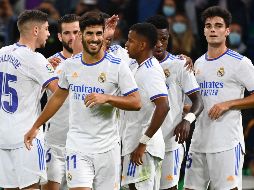 BRILLA. Marco Asensio marcó 3 goles en la victoria del conjunto blanco. AFP/G. BOUYS