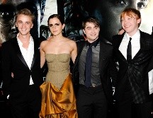 Tom Felton (i) personificó a Draco Malfoy en la saga. AFP/ARCHIVO