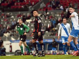Lamentable. Cuando su equipo más lo necesitaba, Aldo Rocha se dio el lujo de fallar un penal que habría significado el empate parcial ante los poblanos. Imago7