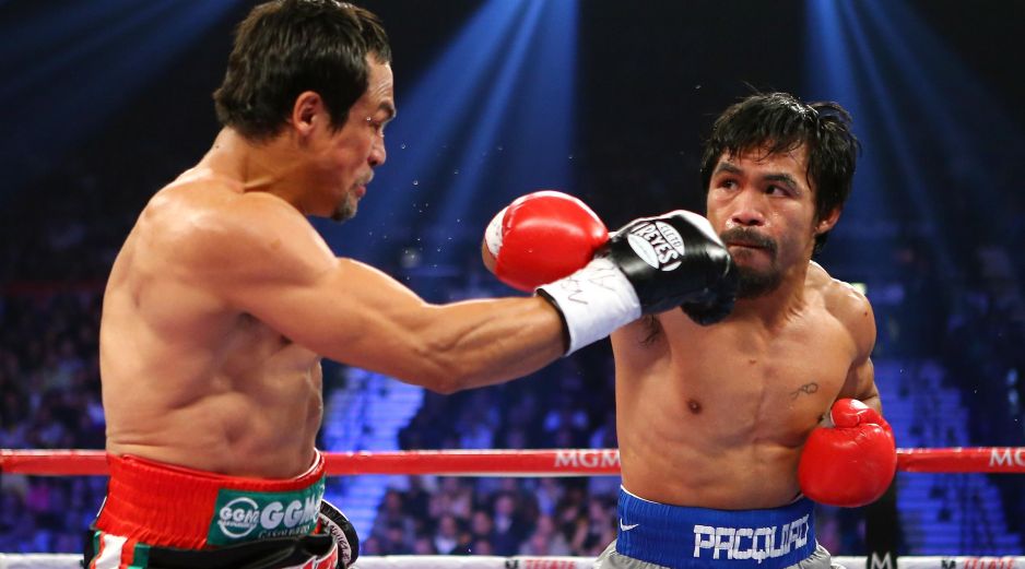 Uno de las grandes rivalidades del boxeo se dio entre Pacquiao y el mexicano Juan Manuel Márquez. AFP / ARCHIVO