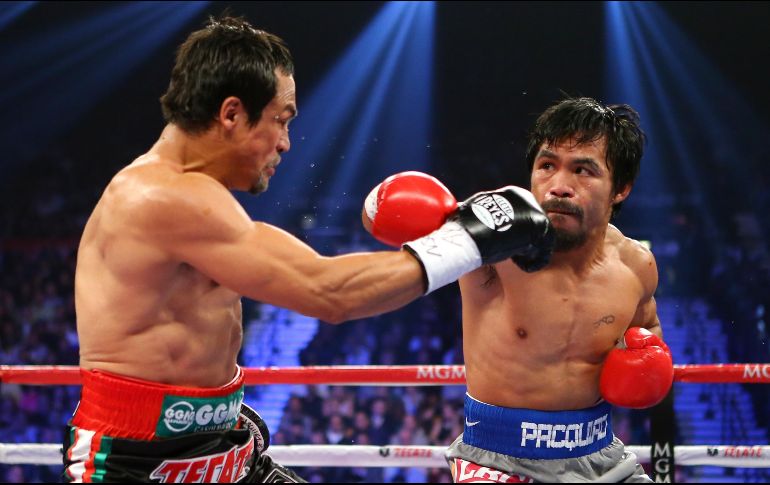 Uno de las grandes rivalidades del boxeo se dio entre Pacquiao y el mexicano Juan Manuel Márquez. AFP / ARCHIVO