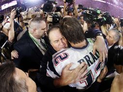 REENCUENTRO. Brady y Belichick marcaron la exitosa historia de los Patriots. AFP/ARCHIVO