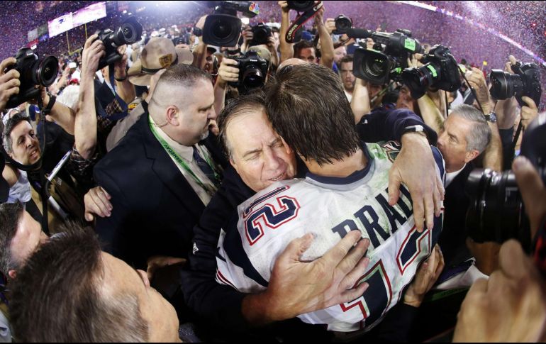 REENCUENTRO. Brady y Belichick marcaron la exitosa historia de los Patriots. AFP/ARCHIVO