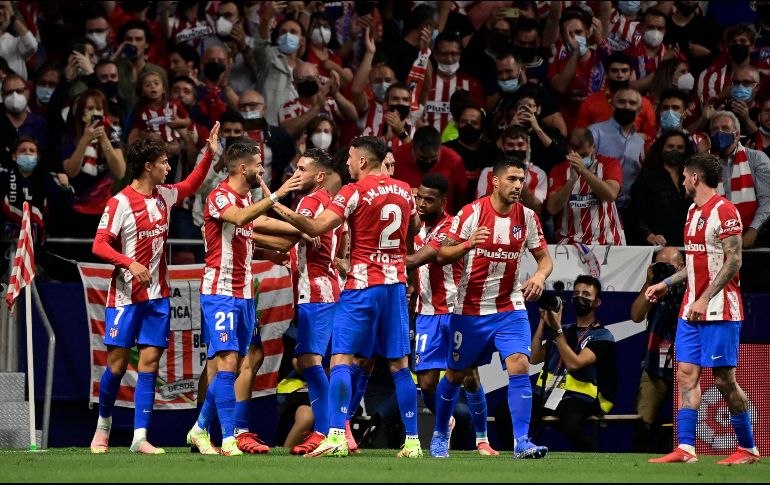 Con este triunfo, el equipo 'Colchonero' empata a puntos con el líder Real Madrid, que el domingo juega en campo del Espanyol. AFP/J. SORIANO